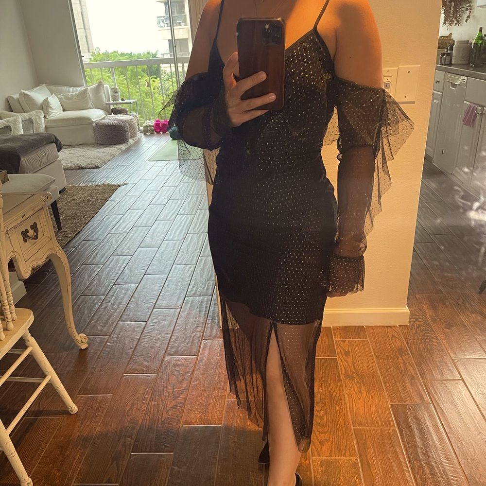 Black with gold detail sheer with lining high low sleeved dress. Size S. New.